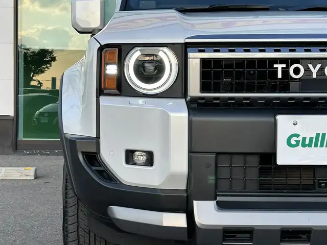 トヨタ ランドクルーザー ２５０ VX 和歌山県 2024(令6)年 0.9万km プラチナホワイトパールマイカ ワンオーナー/純正12.3インチナビ/フルセグTV/Bluetooth/USB/HDMI/全周囲カメラ/ビルトインETC2.0/デジタルインナーミラー/サンルーフ/トヨタセーフティセンス/BSM/レーダークルーズコントロール/クリアランスソナー/パワーバックドア/革巻きステアリング/ステアリングスイッチ/レザーシート/運転席パワーシート/シートメモリー/前席シートヒーター/前席シートベンチレーション/丸目LEDヘッドライト/フォグランプ/オートライト/プッシュスタート/スマートキー/スペアキー/取扱説明書