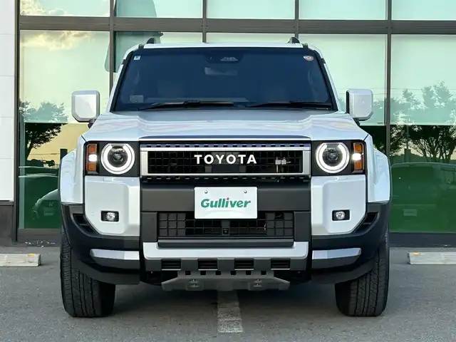 トヨタ ランドクルーザー ２５０ VX 和歌山県 2024(令6)年 0.9万km プラチナホワイトパールマイカ ワンオーナー/純正12.3インチナビ/フルセグTV/Bluetooth/USB/HDMI/全周囲カメラ/ビルトインETC2.0/デジタルインナーミラー/サンルーフ/トヨタセーフティセンス/BSM/レーダークルーズコントロール/クリアランスソナー/パワーバックドア/革巻きステアリング/ステアリングスイッチ/レザーシート/運転席パワーシート/シートメモリー/前席シートヒーター/前席シートベンチレーション/丸目LEDヘッドライト/フォグランプ/オートライト/プッシュスタート/スマートキー/スペアキー/取扱説明書