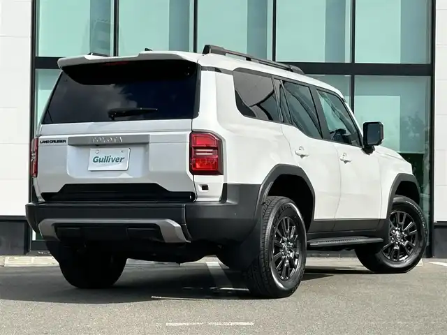 トヨタ ランドクルーザー ２５０ VX 和歌山県 2024(令6)年 0.9万km プラチナホワイトパールマイカ ワンオーナー/純正12.3インチナビ/フルセグTV/Bluetooth/USB/HDMI/全周囲カメラ/ビルトインETC2.0/デジタルインナーミラー/サンルーフ/トヨタセーフティセンス/BSM/レーダークルーズコントロール/クリアランスソナー/パワーバックドア/革巻きステアリング/ステアリングスイッチ/レザーシート/運転席パワーシート/シートメモリー/前席シートヒーター/前席シートベンチレーション/丸目LEDヘッドライト/フォグランプ/オートライト/プッシュスタート/スマートキー/スペアキー/取扱説明書