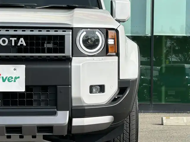 トヨタ ランドクルーザー ２５０ VX 和歌山県 2024(令6)年 0.9万km プラチナホワイトパールマイカ ワンオーナー/純正12.3インチナビ/フルセグTV/Bluetooth/USB/HDMI/全周囲カメラ/ビルトインETC2.0/デジタルインナーミラー/サンルーフ/トヨタセーフティセンス/BSM/レーダークルーズコントロール/クリアランスソナー/パワーバックドア/革巻きステアリング/ステアリングスイッチ/レザーシート/運転席パワーシート/シートメモリー/前席シートヒーター/前席シートベンチレーション/丸目LEDヘッドライト/フォグランプ/オートライト/プッシュスタート/スマートキー/スペアキー/取扱説明書