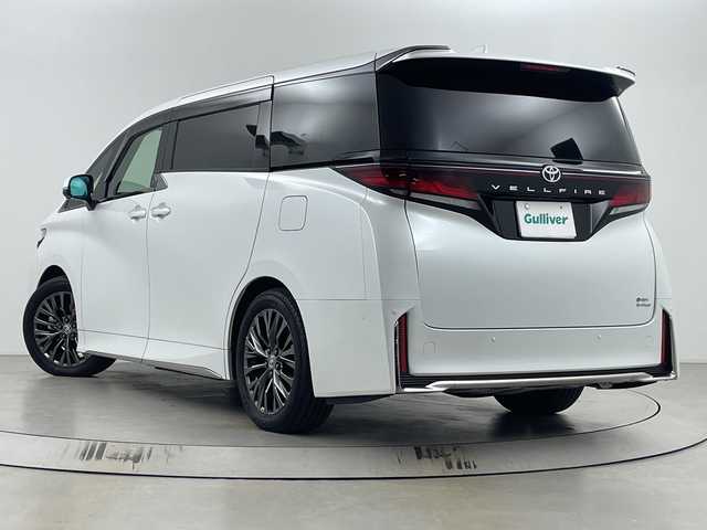 トヨタ ヴェルファイア ハイブリット Z プレミア 埼玉県 2024(令6)年 1.3万km プラチナホワイトパールマイカ ユニバーサルステップ/純正13.2型フリップダウンモニター/ガラスルーフ/純正ディスプレイオーディオ/(Bluetooth/USB/HDMI/AM/FM)/地デジフルセグ/前後ドライブレコーダー/ETC2.0/アダプティブクルーズコントロール/ブラインドスポットモニター/パーキングサポートブレーキ/車線逸脱警報/衝突軽減ブレーキ/クリアランスソナー/オートマチックハイビーム/ヘッドアップディスプレイ/パドルシフト/パワーバックドア/ワイヤレス充電/AC100V/デジタルインナーミラー/シートメモリー/オットマン/シートヒーター・ベンチレーション/電子パーキングシステム/ブレーキホールド/ロールサンシェード/プッシュスタート/ステアリングリモコン/ウィンカーミラー/電動格納ミラー/フロントフォグランプ/社外フロアマット/純正ドアバイザー/純正19インチアルミホイール