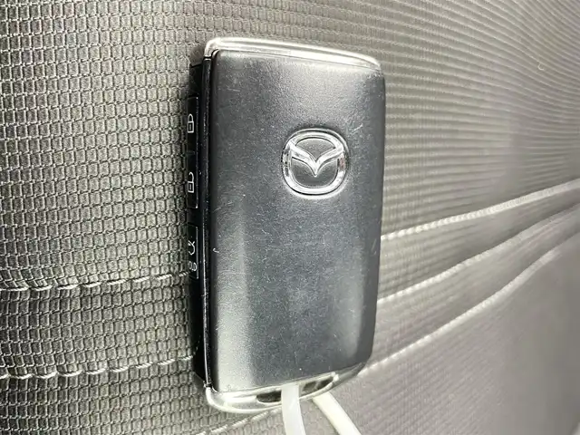 マツダ ロードスター 990S 千葉県 2022(令4)年 1.2万km マシーングレープレミアムM 専用ブルー幌/ブラインドスポットモニター/クリアランスソナー/アドバンスドスマートシティブレーキ/革巻きステアリング/ステアリングスイッチ/ETC/純正オーディオ/・AM/FM/・AUX/RAYSアルミホイール/ｂreｍboブレーキキャリパー/LEDヘッドライト/フォグランプ/オートヘッドライト/電動格納ミラー/純正フロアマット/社外シガーソケット/プッシュスタート