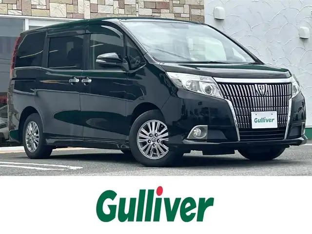 トヨタ エスクァイア Gi 徳島県 2015(平27)年 8.2万km ブラック 純正ナビ/(フルセグ/Bluetooth/DVD/CD)/バックカメラ/ETC/両側パワースライドドア/クルーズコントロール/前席シートヒーター/ロール式サンシェード/オートライト/LEDヘッドライト/フォグランプ