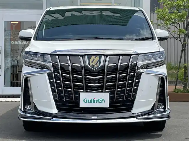 トヨタ アルファードハイブリット S タイプゴールド 道央・札幌 2020(令2)年 6.3万km ホワイトパールクリスタルシャイン ・４WD/・ワンオーナー/・衝突軽減ブレーキ/・サンルーフ/・モデリスタエアロ/・パーキングアシスト/・純正ナビ/　CD＆DVD＆BT＆TV/・バックカメラ/・全方位カメラ/・ブラインドスポットモニター/・パワーバックドア/・両側パワースライドドア/・フリップダウンモニター/・レーダークルーズコントロール/・コーナーセンサー/・レーンキープアシスト/・オートエアコン/・オートライト/・オートリトラミラー/・MT付きAT/・ビルトインETC/・JBLプレミアムサウンド/・三眼ライト/・プッシュスタート/・スマートキー/・クレンツェ20インチAW/・純正フロアマット/・ドアバイザー/・ウィンカーミラー/・フォグライト