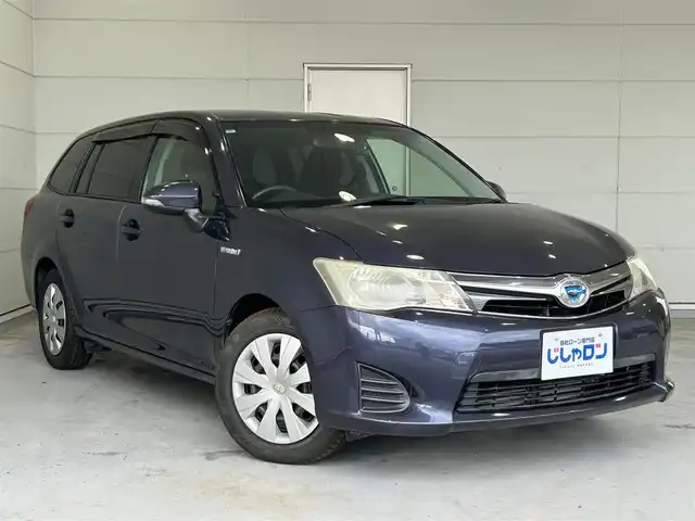 トヨタ カローラ フィールダー ハイブリッドG 沖縄県 2013(平25)年 5.3万km ダークバイオレットマイカメタリック (株)IDOMが運営する【じしゃロンOO店】の自社ローン専用車両になりますこちらは現金またはオートローンご利用時の価格です。自社ローンご希望の方は別途その旨お申付け下さい/・プッシュスタート　/・純正ナビ　/・ＴＶ　/・バックカメラ　/・ＥＴＣ　/・Ｂｌｕｅｔｏｏｔｈ接続　/・ドライブレコーダー　/・横滑り防止装置　/・スマートキー　/・アイドリングストップ　/・取扱説明書