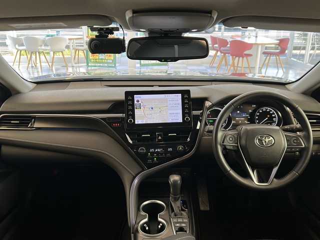 トヨタ カムリ WSレザーパッケージ 岐阜県 2021(令3)年 2万km アティチュードブラックマイカ 純正９インチディスプレイオーディオ/パノラミックビューモニター/ブラインドスポットモニター/ヘッドアップディスプレイ/黒レザーシート/シートヒーター/ビルトインＥＴＣ/セーフティセンス/レーダークルーズコントロール/ＬＥＤヘッドライト