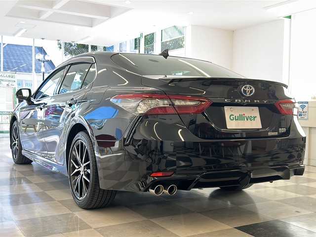 トヨタ カムリ WSレザーパッケージ 岐阜県 2021(令3)年 2万km アティチュードブラックマイカ 純正９インチディスプレイオーディオ/パノラミックビューモニター/ブラインドスポットモニター/ヘッドアップディスプレイ/黒レザーシート/シートヒーター/ビルトインＥＴＣ/セーフティセンス/レーダークルーズコントロール/ＬＥＤヘッドライト