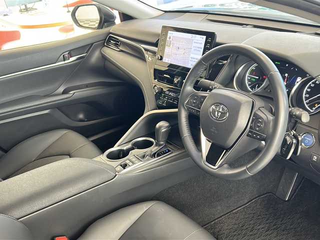 トヨタ カムリ WSレザーパッケージ 岐阜県 2021(令3)年 2万km アティチュードブラックマイカ 純正９インチディスプレイオーディオ/パノラミックビューモニター/ブラインドスポットモニター/ヘッドアップディスプレイ/黒レザーシート/シートヒーター/ビルトインＥＴＣ/セーフティセンス/レーダークルーズコントロール/ＬＥＤヘッドライト