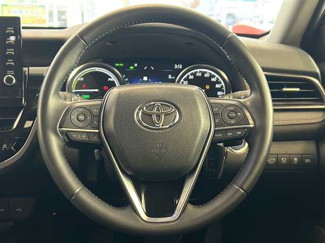 トヨタ カムリ WSレザーパッケージ 岐阜県 2021(令3)年 2万km アティチュードブラックマイカ 純正９インチディスプレイオーディオ/パノラミックビューモニター/ブラインドスポットモニター/ヘッドアップディスプレイ/黒レザーシート/シートヒーター/ビルトインＥＴＣ/セーフティセンス/レーダークルーズコントロール/ＬＥＤヘッドライト