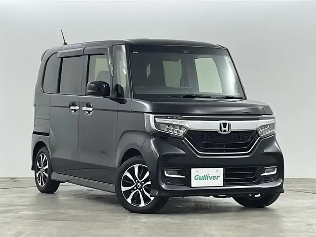 ホンダ Ｎ ＢＯＸ カスタム G L ホンダセンシング 福島県 2017(平29)年 2.8万km クリスタルブラックパール ホンダセンシング/・衝突軽減ブレーキ/・誤発進抑制機能/・歩行者事故低減ステアリング/・路外逸脱抑制機能/・先行車発進お知らせ機能/・標識認識機能/・渋滞追従機能付きアダプティブクルーズコントロール/・レーンキープアシスト/純正ナビゲーション/型式：VXM-174VFXI/【TV/BT/CD/DVD/USB/AM・FM】/・バックカメラ/ETC/前方ドライブレコーダー/後方コーナーセンサー/片側パワースライドドア/LEDライト/・オートライト/・オートハイビーム/・フォグライト/ステアリングリモコン/プッシュスタート/・スマートキー/ドアバイザー/純正フロアマット/電動格納ウィンカーミラー/エアロパーツ（サイド）