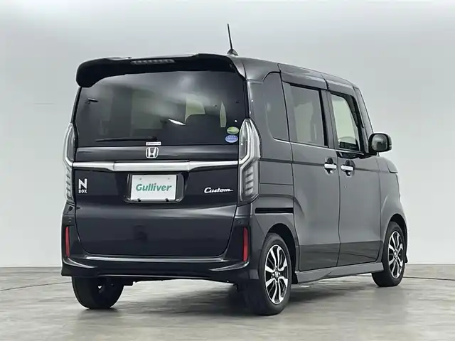 ホンダ Ｎ ＢＯＸ カスタム G L ホンダセンシング 福島県 2017(平29)年 2.8万km クリスタルブラックパール ホンダセンシング/・衝突軽減ブレーキ/・誤発進抑制機能/・歩行者事故低減ステアリング/・路外逸脱抑制機能/・先行車発進お知らせ機能/・標識認識機能/・渋滞追従機能付きアダプティブクルーズコントロール/・レーンキープアシスト/純正ナビゲーション/型式：VXM-174VFXI/【TV/BT/CD/DVD/USB/AM・FM】/・バックカメラ/ETC/前方ドライブレコーダー/後方コーナーセンサー/片側パワースライドドア/LEDライト/・オートライト/・オートハイビーム/・フォグライト/ステアリングリモコン/プッシュスタート/・スマートキー/ドアバイザー/純正フロアマット/電動格納ウィンカーミラー/エアロパーツ（サイド）