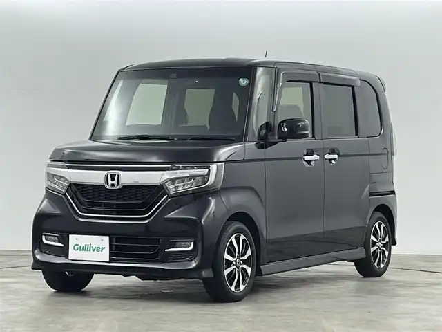 ホンダ Ｎ ＢＯＸ カスタム G L ホンダセンシング 福島県 2017(平29)年 2.8万km クリスタルブラックパール ホンダセンシング/・衝突軽減ブレーキ/・誤発進抑制機能/・歩行者事故低減ステアリング/・路外逸脱抑制機能/・先行車発進お知らせ機能/・標識認識機能/・渋滞追従機能付きアダプティブクルーズコントロール/・レーンキープアシスト/純正ナビゲーション/型式：VXM-174VFXI/【TV/BT/CD/DVD/USB/AM・FM】/・バックカメラ/ETC/前方ドライブレコーダー/後方コーナーセンサー/片側パワースライドドア/LEDライト/・オートライト/・オートハイビーム/・フォグライト/ステアリングリモコン/プッシュスタート/・スマートキー/ドアバイザー/純正フロアマット/電動格納ウィンカーミラー/エアロパーツ（サイド）