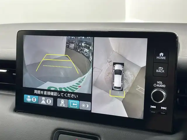 ホンダ ヴェゼル ハイブリッド e:HEV Z 大阪府 2021(令3)年 1.1万km プレミアムサンライトホワイトパール Moduloフロントグリル/18incAW ホンダセンシング シーケンシャル 純正9incナビTV 360カメラ ETC ハーフレザー シートヒーター 電動リアゲート 衝突軽減 レーダーC BSM 置くだけ充電