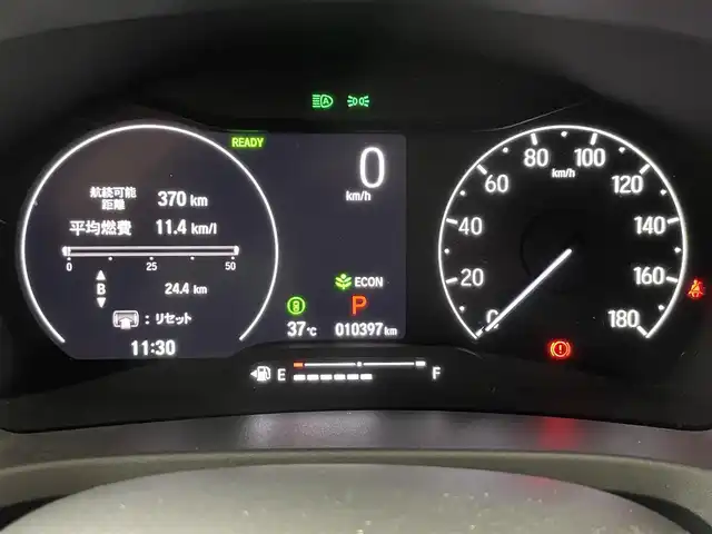 ホンダ ヴェゼル ハイブリッド e:HEV Z 大阪府 2021(令3)年 1.1万km プレミアムサンライトホワイトパール Moduloフロントグリル/18incAW ホンダセンシング シーケンシャル 純正9incナビTV 360カメラ ETC ハーフレザー シートヒーター 電動リアゲート 衝突軽減 レーダーC BSM 置くだけ充電