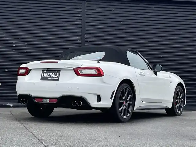 アバルト １２４ スパイダー 三重県 2020(令2)年 2.1万km パール レコードモンツァマフラー/純正ビルシュタイン/純正ナビＴＶ/ＯＰレザーシート(赤黒コンビ)/シートヒーター/クルコン/Ｂカメラ/ＬＥＤライト/Ｂｌｕｅｔｏｏｔｈ/ドラレコ/純正１７インチＡＷ/ビアンコアクロポリス1972