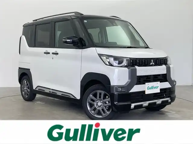 三菱 デリカミニ T プレミアム 富山県 2025(令7)年 0.1千km アメジストブラック/シルキーホワイト T　PREMIUM　4WD　/純正9型ディスプレイオーディオ（121330）（DA22JM)/　　－－bluetooth、Carplay、Androidauto/サイドデカール（33440）/全周囲カメラ/前後コーナーセンサー/前席シートヒーター/ステアリングヒーター/両側パワースライドドア（フットオープン可）/純正15インチAW/ACC/衝突軽減ブレーキ/車線逸脱警報/車線逸脱防止支援/MIパイロット/先行車発進お知らせ/スマートキー/プッシュスタート/オートライト/LEDヘッドライト/フォグ/ルーフレール/オートホールド/ヒルディセントコントロール/パドルシフト/横滑防止装置/保証書、取説/スペアキー