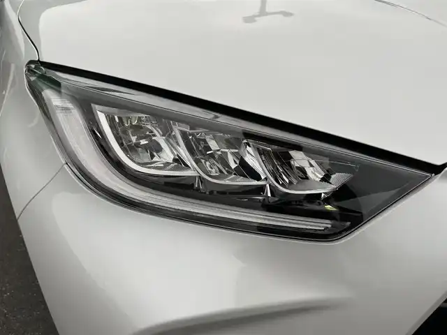トヨタ ヤリス ハイブリッド Z 茨城県 2023(令5)年 1.5万km プラチナホワイトパールマイカ 純正8型ディスプレイオーディオ/AppleCarPlay/レーダー付きクルーズコントロール/ビルトインETC/アラウンドビューモニター/シートヒーター/純正フロアマット/横滑り防止装置/コーナーセンサー前後/レーンキープアシスト/オートライト/オートマチックハイビーム/LEDヘッドライト/ステアリングヒーター/ブラインドスポットモニター