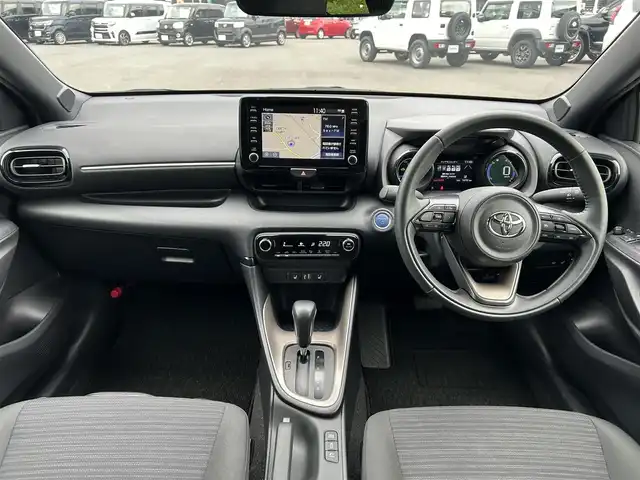 トヨタ ヤリス ハイブリッド Z 茨城県 2023(令5)年 1.5万km プラチナホワイトパールマイカ 純正8型ディスプレイオーディオ/AppleCarPlay/レーダー付きクルーズコントロール/ビルトインETC/アラウンドビューモニター/シートヒーター/純正フロアマット/横滑り防止装置/コーナーセンサー前後/レーンキープアシスト/オートライト/オートマチックハイビーム/LEDヘッドライト/ステアリングヒーター/ブラインドスポットモニター