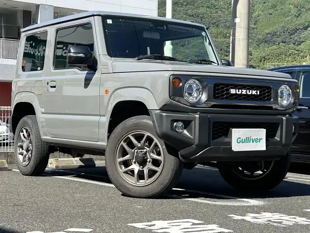 スズキ ジムニー XC 長崎県 2021(令3)年 4.5万km ミディアムグレー ・社外SDナビ（AM/FM/CD/DVD/HDMI）/・衝突軽減ブレーキ/・LDA/・バックカメラ/・電格ウィンカーミラー/・ステアリングスイッチ/・ミラーデフォッガー/・クルーズコントロール/・ビルトインETC/・前席シートヒーター/・フロアマット