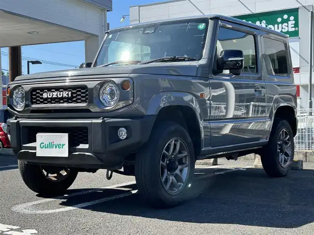 スズキ ジムニー XC 長崎県 2021(令3)年 4.5万km ミディアムグレー ・社外SDナビ（AM/FM/CD/DVD/HDMI）/・衝突軽減ブレーキ/・LDA/・バックカメラ/・電格ウィンカーミラー/・ステアリングスイッチ/・ミラーデフォッガー/・クルーズコントロール/・ビルトインETC/・前席シートヒーター/・フロアマット