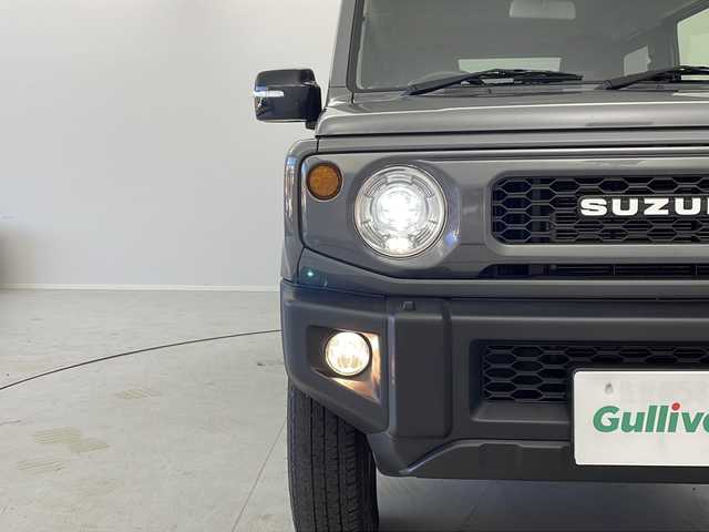 スズキ ジムニー XC 茨城県 2021(令3)年 4.5万km ミディアムグレー ・社外SDナビ（AM/FM/CD/DVD/HDMI）/・衝突軽減ブレーキ/・LDA/・バックカメラ/・電格ウィンカーミラー/・ステアリングスイッチ/・ミラーデフォッガー/・クルーズコントロール/・ビルトインETC/・前席シートヒーター/・フロアマット