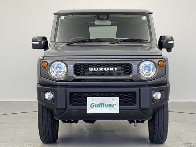 スズキ ジムニー XC 茨城県 2021(令3)年 4.5万km ミディアムグレー ・社外SDナビ（AM/FM/CD/DVD/HDMI）/・衝突軽減ブレーキ/・LDA/・バックカメラ/・電格ウィンカーミラー/・ステアリングスイッチ/・ミラーデフォッガー/・クルーズコントロール/・ビルトインETC/・前席シートヒーター/・フロアマット