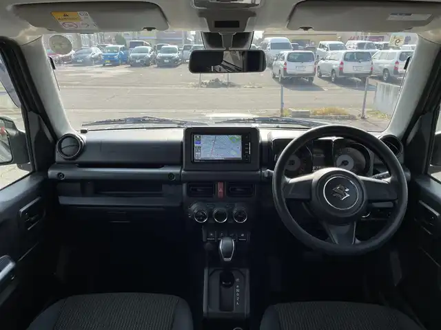 スズキ ジムニー XL 青森県 2021(令3)年 2.7万km ミディアムグレー 4WD/ワンオーナー/寒冷地仕様/純正16AW/社外メモリナビ/・フルセグTV/AM/FM/CD/DVD/BT/背面タイヤ/前席シートヒーター/フォグランプ/オートライト/横滑り防止機能/ヒルスタートアシスト/衝突軽減ブレーキ/車線逸脱警報/盗難防止機能/UVカットガラス/プライバシーガラス/セキュリティアラーム/スペアキー/保証書/取扱説明書