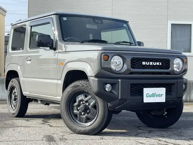 スズキ ジムニー XL 青森県 2021(令3)年 2.7万km ミディアムグレー 4WD/ワンオーナー/寒冷地仕様/純正16AW/社外メモリナビ/・フルセグTV/AM/FM/CD/DVD/BT/背面タイヤ/前席シートヒーター/フォグランプ/オートライト/横滑り防止機能/ヒルスタートアシスト/衝突軽減ブレーキ/車線逸脱警報/盗難防止機能/UVカットガラス/プライバシーガラス/セキュリティアラーム/スペアキー/保証書/取扱説明書