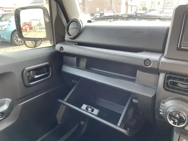 スズキ ジムニー XL 青森県 2021(令3)年 2.7万km ミディアムグレー 4WD/ワンオーナー/寒冷地仕様/純正16AW/社外メモリナビ/・フルセグTV/AM/FM/CD/DVD/BT/背面タイヤ/前席シートヒーター/フォグランプ/オートライト/横滑り防止機能/ヒルスタートアシスト/衝突軽減ブレーキ/車線逸脱警報/盗難防止機能/UVカットガラス/プライバシーガラス/セキュリティアラーム/スペアキー/保証書/取扱説明書