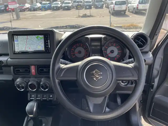 スズキ ジムニー XL 青森県 2021(令3)年 2.7万km ミディアムグレー 4WD/ワンオーナー/寒冷地仕様/純正16AW/社外メモリナビ/・フルセグTV/AM/FM/CD/DVD/BT/背面タイヤ/前席シートヒーター/フォグランプ/オートライト/横滑り防止機能/ヒルスタートアシスト/衝突軽減ブレーキ/車線逸脱警報/盗難防止機能/UVカットガラス/プライバシーガラス/セキュリティアラーム/スペアキー/保証書/取扱説明書