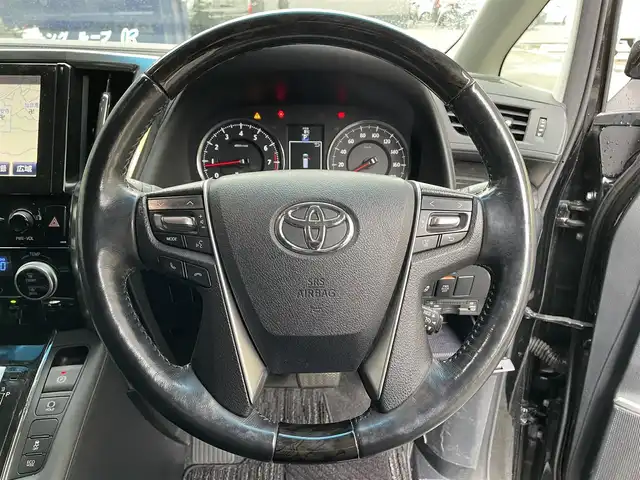 トヨタ ヴェルファイア Z Gエディション 滋賀県 2017(平29)年 7.3万km ブラック 純正10.5インチナビ/【Bluetooth/CD/DVD/Bru-ray/USB/フルセグTV/HDMI】/純正フリップダウンモニター/JBLプレミアムサウンド/ハーフレザーシート/両側パワースライドドア/バックカメラ/クルーズコントロール/クリアランスソナー/LEDヘッドライト/オートマチックハイビーム/衝突軽減ブレーキ/前後ドライブレコーダー/ビルトインETC/D/Nパワーシート/D/Nシートヒーター/D/Nシートベンチレーション/二列目パワーリクライニング/助手席/二列目パワーオットマン/ステアリングヒーター/パワーバックドア/電動パーキングブレーキ/オートブレーキホールド/パーキングアシスト/プッシュスタート/スマートキー/ステアリングリモコン