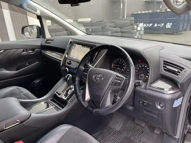 トヨタ ヴェルファイア Z Gエディション 滋賀県 2017(平29)年 7.3万km ブラック 純正10.5インチナビ/【Bluetooth/CD/DVD/Bru-ray/USB/フルセグTV/HDMI】/純正フリップダウンモニター/JBLプレミアムサウンド/ハーフレザーシート/両側パワースライドドア/バックカメラ/クルーズコントロール/クリアランスソナー/LEDヘッドライト/オートマチックハイビーム/衝突軽減ブレーキ/前後ドライブレコーダー/ビルトインETC/D/Nパワーシート/D/Nシートヒーター/D/Nシートベンチレーション/二列目パワーリクライニング/助手席/二列目パワーオットマン/ステアリングヒーター/パワーバックドア/電動パーキングブレーキ/オートブレーキホールド/パーキングアシスト/プッシュスタート/スマートキー/ステアリングリモコン