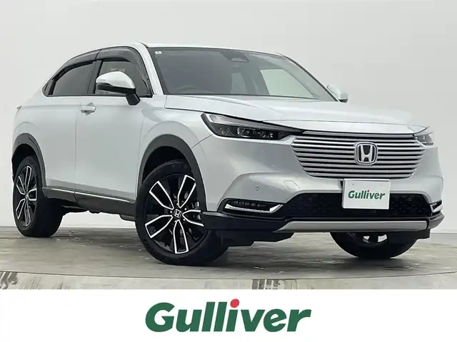 ホンダ ヴェゼル ハイブリッド e:HEV Z 宮城県 2022(令4)年 0.9万km プレミアムサンライトホワイトパール 4WD/純正９型コネクトナビ/フルセグTV/ＢＳＭ/パワーバックドア/アダプティブクルーズ　/シートヒーター/フロントウィンドウ熱線/ヒーテッドドアミラー/ワイヤレス充電/ハーフレザーシート/ドライブレコーダー/ＥＴＣ２．０/ホンダセンシング/パーキングセンサー/スマートフォン連携 /禁煙車