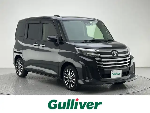 トヨタ ルーミー カスタムG－T 兵庫県 2023(令5)年 1.1万km ブラックマイカメタリック ・純正SDナビ/・全方位モニタ-/・純正前後ドライブレコーダー/・ETC2.0/・両側パワースライドドア/・衝突軽減ブレーキ/・レーンキープアシスト/・追従クルーズコントロール/・電子パーキングブレーキ/・純正15インチアルミホイール/・オートライト/・オートハイビーム/・LEDヘッドライト/・LEDフォグランプ/・前後コーナーセンサー/・純正フロアマット/・スマートキー/・スペアキー1本/・プッシュスタート