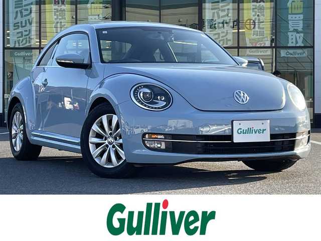 フォルクスワーゲン ザ・ビートル デザイン 岡山県 2012(平24)年 4.2万km デニムブルー 登録時走行距離41921km/社外ナビ/地デジTV(AM/FM/CD/DVD)/バックカメラ/ドライブレコーダー/コーナーセンサー/MTモード付AT/リモコンキー/16インチ純正AW/フロアマット/電動格納ミラー/ウィンカーミラー