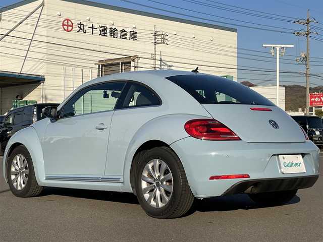 フォルクスワーゲン ザ・ビートル デザイン 岡山県 2012(平24)年 4.2万km デニムブルー 登録時走行距離41921km/社外ナビ/地デジTV(AM/FM/CD/DVD)/バックカメラ/ドライブレコーダー/コーナーセンサー/MTモード付AT/リモコンキー/16インチ純正AW/フロアマット/電動格納ミラー/ウィンカーミラー