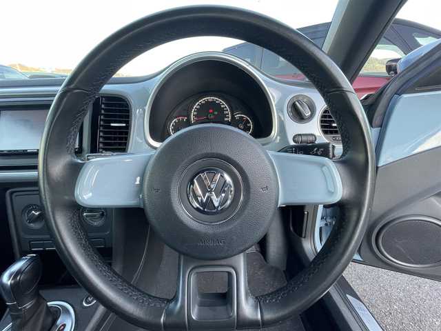 フォルクスワーゲン ザ・ビートル デザイン 岡山県 2012(平24)年 4.2万km デニムブルー 登録時走行距離41921km/社外ナビ/地デジTV(AM/FM/CD/DVD)/バックカメラ/ドライブレコーダー/コーナーセンサー/MTモード付AT/リモコンキー/16インチ純正AW/フロアマット/電動格納ミラー/ウィンカーミラー