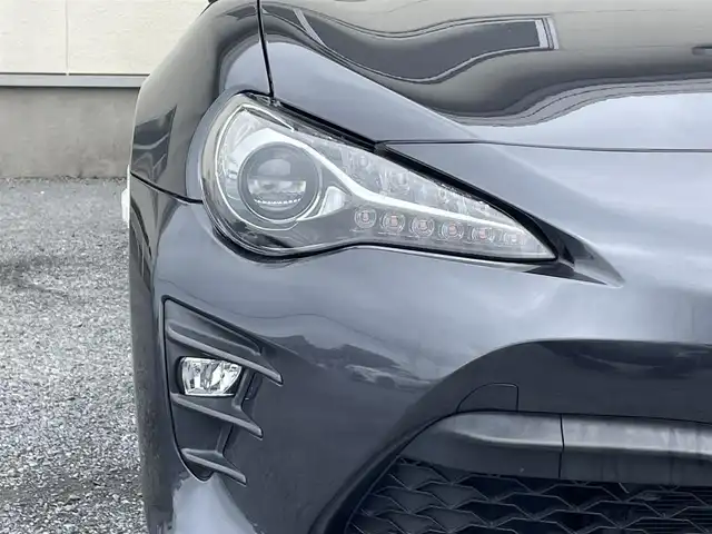 トヨタ ８６ GT リミテッド 茨城県 2016(平28)年 4万km ダークグレーメタリック 後期型モデル/純正ナビ/バックカメラ/革巻きステアリング/ステアリングスイッチ/フルセグテレビ/バックカメラ/スマートキー/プッシュスタート/ハーフレザーシート/シートヒーター/クルーズコントロール/純正フロアマット/LEDヘッドライト/ETC/リアウイング