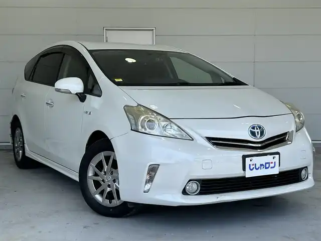トヨタ プリウス α S チューンブラック 沖縄県 2014(平26)年 4万km ホワイトパールクリスタルシャイン (株)IDOMが運営する【じしゃロンOO店】の自社ローン専用車両になりますこちらは現金またはオートローンご利用時の価格です。自社ローンご希望の方は別途その旨お申付け下さい/・プッシュスタート　/・純正ナビ　/・ＴＶ　/・Bluetooth接続　/・ＥＴＣ　/・バックカメラ　/・ドライブレコーダー　/・純正フロアマット　/・純正アルミホイール　/・取扱説明書　/・カーテンエアバック　/・スマートキー