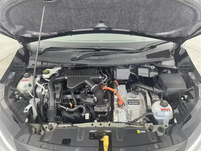 日産 オーラ G レザーエディション 大分県 2022(令4)年 1.2万km ミッドナイトブラック/サンライズカッパー 純正ナビ/（フルセグ/applecarplay/AM/FM)/BOSEサウンド/全周囲カメラ　/ＥＴＣ　/前後クリアランスソナー　/インテリジェントエマージェンシーブレーキ/・踏み間違い防止　/・車線逸脱防止支援システム　/・車線逸脱警報/・ふらつき警報　/・標識認識機能/・後側方衝突防止支援システム/・後側方車両検知警報/・後退車両検知警報/・オートマチックハイビーム/・ブラインドスポットモニター/デジタルインナーミラー/前方ドライブレコーダー/レザーシート/ステアリングヒーター/前席シートヒーター/電動パーキングブレーキ/オートブレーキホールド/オートライト/ステアリングスイッチ/LEDヘッドライト/フォグライト/プッシュスタート/純正アルミホイール/保証書・取扱説明書/スペアキー