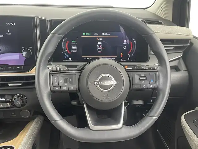 日産 オーラ G レザーエディション 大分県 2022(令4)年 1.2万km ミッドナイトブラック/サンライズカッパー 純正ナビ/（フルセグ/applecarplay/AM/FM)/BOSEサウンド/全周囲カメラ　/ＥＴＣ　/前後クリアランスソナー　/インテリジェントエマージェンシーブレーキ/・踏み間違い防止　/・車線逸脱防止支援システム　/・車線逸脱警報/・ふらつき警報　/・標識認識機能/・後側方衝突防止支援システム/・後側方車両検知警報/・後退車両検知警報/・オートマチックハイビーム/・ブラインドスポットモニター/デジタルインナーミラー/前方ドライブレコーダー/レザーシート/ステアリングヒーター/前席シートヒーター/電動パーキングブレーキ/オートブレーキホールド/オートライト/ステアリングスイッチ/LEDヘッドライト/フォグライト/プッシュスタート/純正アルミホイール/保証書・取扱説明書/スペアキー