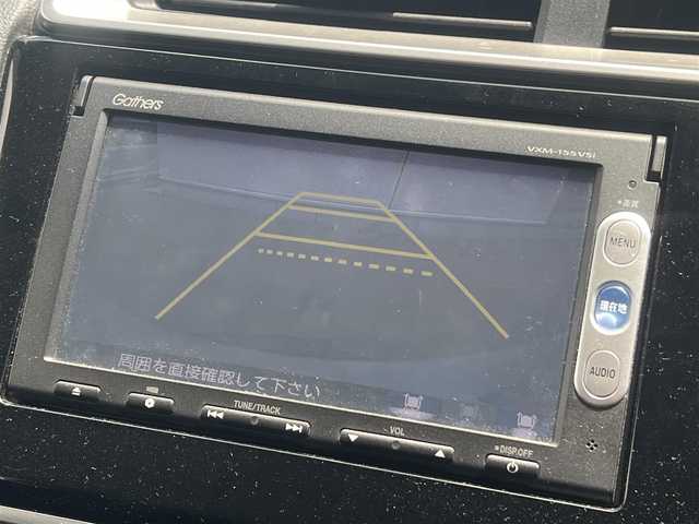 ホンダ フィット 13G Fパッケージ 秋田県 2015(平27)年 13.1万km プレミアムホワイトパール ４WD/純正ナビ/ワンセグ/バックカメラ/社外アルミ/スマートキー/アイドリングストップ/プッシュスタート/ステアリングスイッチ/ETC/純正フロアマット/純正ドアバイザー/オートエアコン/パワーステアリング/パワーウィンドウ/レベライザー/横滑り防止/電動格納ウィンカーミラー/保証書/取扱説明書/記録簿