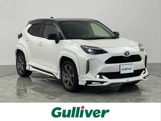 トヨタ ヤリスクロス ハイブリッド Z 愛知県 2021(令3)年 6.7万km ブラックマイカ/ホワイトパールクリスタルシャイン 2トーン モデリスタエアロパーツ/　　・フロントグリルガーニッシュ/　　・フロントスポイラー/　　・サイドスカート/　　・リヤスカート/　　・カラードフェンダー/　　・ルーフスポイラー/　　・LEDライセンスランプ/アルパイン製デジタルインナーミラー/純正ドライブレコーダー/ビルトインETC2.0/ステアリングリモコン/ステアリングヒーター/純正8インチコネクテッドナビ付ディスプレイオーディオ/テレビキット付/ハーフレザーシート/パワーシート/シートヒーター（前席）/トヨタセーフティセンス/　　・プリクラッシュセーフティ/　　・レーダークルーズコントロール/　　・レーンディバーチャーアラート/　　・ロードサインアシスト/BSM/スマートキー