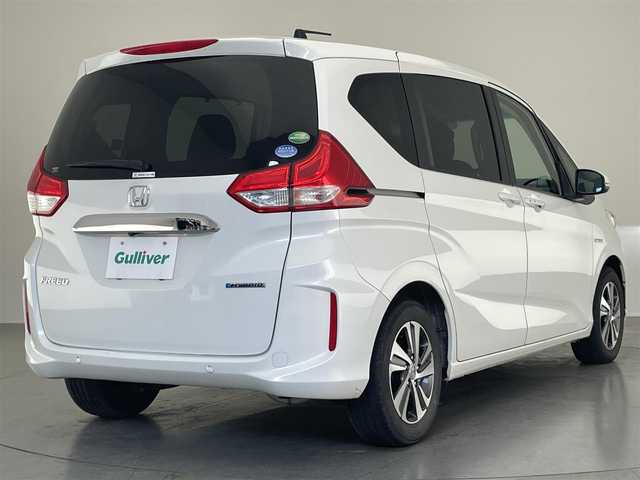 ホンダ フリード ハイブリット G ホンダセンシング 愛知県 2020(令2)年 4.2万km プラチナホワイトパール 純正ナビ　フルセグＴＶ　Ｂｌｕｅｔｏｏｔｈ　バックカメラ　両側電動スライドドア　ホンダセンシング　ＬＥＤヘッドライト　シートヒーター　衝突軽減　黒ハーフレザー　レーンキープ　プッシュスタート　禁煙車
