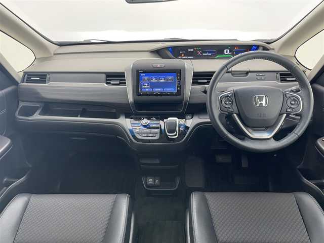 ホンダ フリード ハイブリット G ホンダセンシング 愛知県 2020(令2)年 4.2万km プラチナホワイトパール 純正ナビ　フルセグＴＶ　Ｂｌｕｅｔｏｏｔｈ　バックカメラ　両側電動スライドドア　ホンダセンシング　ＬＥＤヘッドライト　シートヒーター　衝突軽減　黒ハーフレザー　レーンキープ　プッシュスタート　禁煙車
