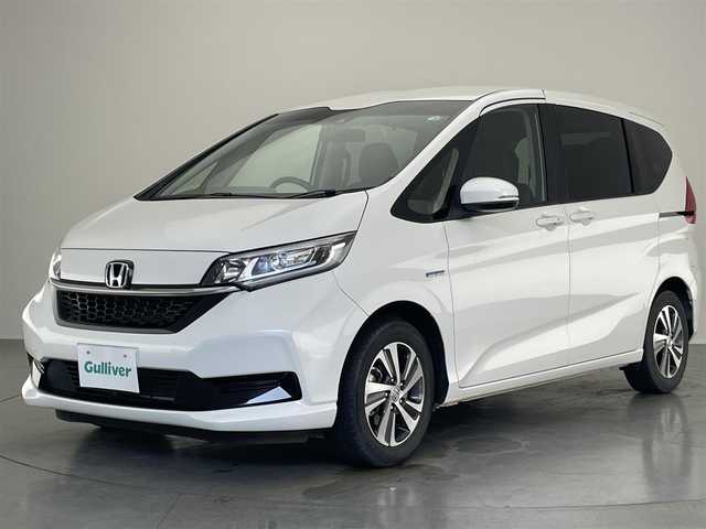 ホンダ フリード ハイブリット G ホンダセンシング 愛知県 2020(令2)年 4.2万km プラチナホワイトパール 純正ナビ　フルセグＴＶ　Ｂｌｕｅｔｏｏｔｈ　バックカメラ　両側電動スライドドア　ホンダセンシング　ＬＥＤヘッドライト　シートヒーター　衝突軽減　黒ハーフレザー　レーンキープ　プッシュスタート　禁煙車