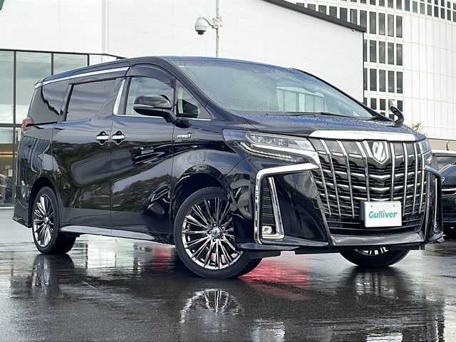 トヨタ アルファードハイブリット SR 青森県 2019(令1)年 7.3万km ブラック ・4WD/・本革シート(黒)/・純正ナビ/・12.1フリップダウンモニター/・フルセグTV/・Bluetooth/・USB端子/・バックカメラ/・両側パワースライドドア/・パワーバックドア/・前後ドライブレコーダー/・衝突軽減ブレーキ/・レーダークルーズコントロール/・レーンキープアシスト/・オートマチックハイビーム/・シートヒーター/・スマートキー/・LEDヘッドライト/・LEDフォグ/・19インチAW(VERSUS)/・保証書・取説あり