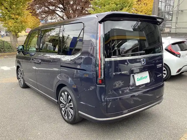 ホンダ ステップワゴン スパーダ eHEV プレミアムライン 神奈川県 2022(令4)年 1.1万km トワイライトミストブラックパール ワンオーナー/純正11.4型メモリーナビゲーション/Bluetooth　フルセグ　SD　CD　DVD　AppleCarPlay USB/フリップダウンモニタ/ドライブレコーダー/両側電動スライドドア/ホンダセンシング/マルチビューカメラ/ブラインドスポットインフォメーション/衝突軽減ブレーキ/歩行者事故低減ステアリング/渋滞追従機能付アダプティブクルーズコントロール/車線維持支援システム/先行車発進お知らせ機能/オートハイビーム/アダプティブドライビングビーム/誤発進抑制機能/近距離衝突軽減ブレーキ/路外逸脱抑制機能/トラフィックジャムアシスト/標識認識機能/ハーフレザーシート/前席二列目シートヒーター/ETC/パワーバックドア/電動サイドブレーキ/ブレーキオートホールド/2列目オットマン/革巻きステアリング/ステアリングスイッチ/パドルシフト/プッシュスタート/電動格納ミラー/純正フロアマット/ドアバイザー/オートライト/LEDヘッドライト/フォグライト/純正17インチアルミホイル