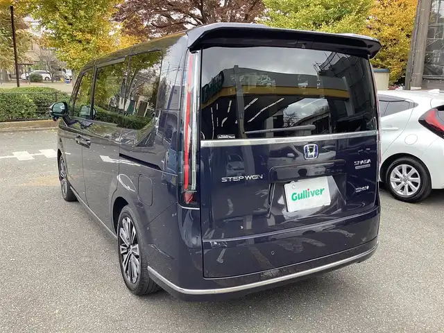 ホンダ ステップワゴン スパーダ eHEV プレミアムライン 神奈川県 2022(令4)年 1.1万km トワイライトミストブラックパール ワンオーナー/純正11.4型メモリーナビゲーション/Bluetooth　フルセグ　SD　CD　DVD　AppleCarPlay USB/フリップダウンモニタ/ドライブレコーダー/両側電動スライドドア/ホンダセンシング/マルチビューカメラ/ブラインドスポットインフォメーション/衝突軽減ブレーキ/歩行者事故低減ステアリング/渋滞追従機能付アダプティブクルーズコントロール/車線維持支援システム/先行車発進お知らせ機能/オートハイビーム/アダプティブドライビングビーム/誤発進抑制機能/近距離衝突軽減ブレーキ/路外逸脱抑制機能/トラフィックジャムアシスト/標識認識機能/ハーフレザーシート/前席二列目シートヒーター/ETC/パワーバックドア/電動サイドブレーキ/ブレーキオートホールド/2列目オットマン/革巻きステアリング/ステアリングスイッチ/パドルシフト/プッシュスタート/電動格納ミラー/純正フロアマット/ドアバイザー/オートライト/LEDヘッドライト/フォグライト/純正17インチアルミホイル
