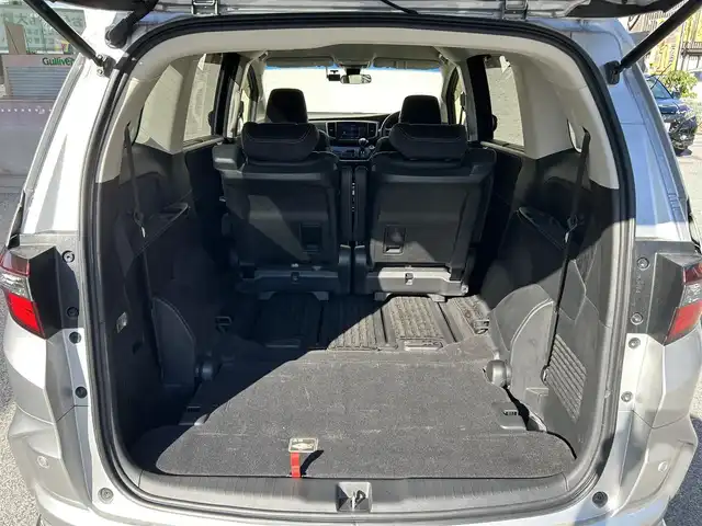 ホンダ オデッセイ アブソルート・EXホンダセンジング 滋賀県 2019(平31)年 6.1万km スーパープラチナメタリック 純正メーカーナビ/（AM/FM/CD/DVD/TVフルセグ//Bluetooth/USB/SD）/衝突軽減ブレーキ/両側パワースライドドア/レーンキープアシスト/レーダークルーズコントロール/コーナーセンサー/横滑り防止/ETC2.0/ステアリングスイッチ/ブラインドスポットモニター/360度カメラ（フロント/サイド/リア）/パーキングサポート/ハンズフリー/ECON/電動格納ミラー/シートヒーターD/N/プッシュスタート/スマートキー/アイドリングストップ/後席オットマン/HDMI/USB/ドライブレコーダー前後/パドルシフト/純正ドアバイザー/純正フロアマット/後席エアコン/オートライト/フロントフォグ